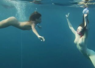 women swimming nude